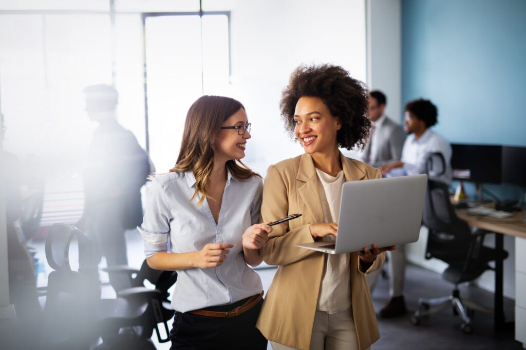 Two professionals having a positive interaction in the workplace