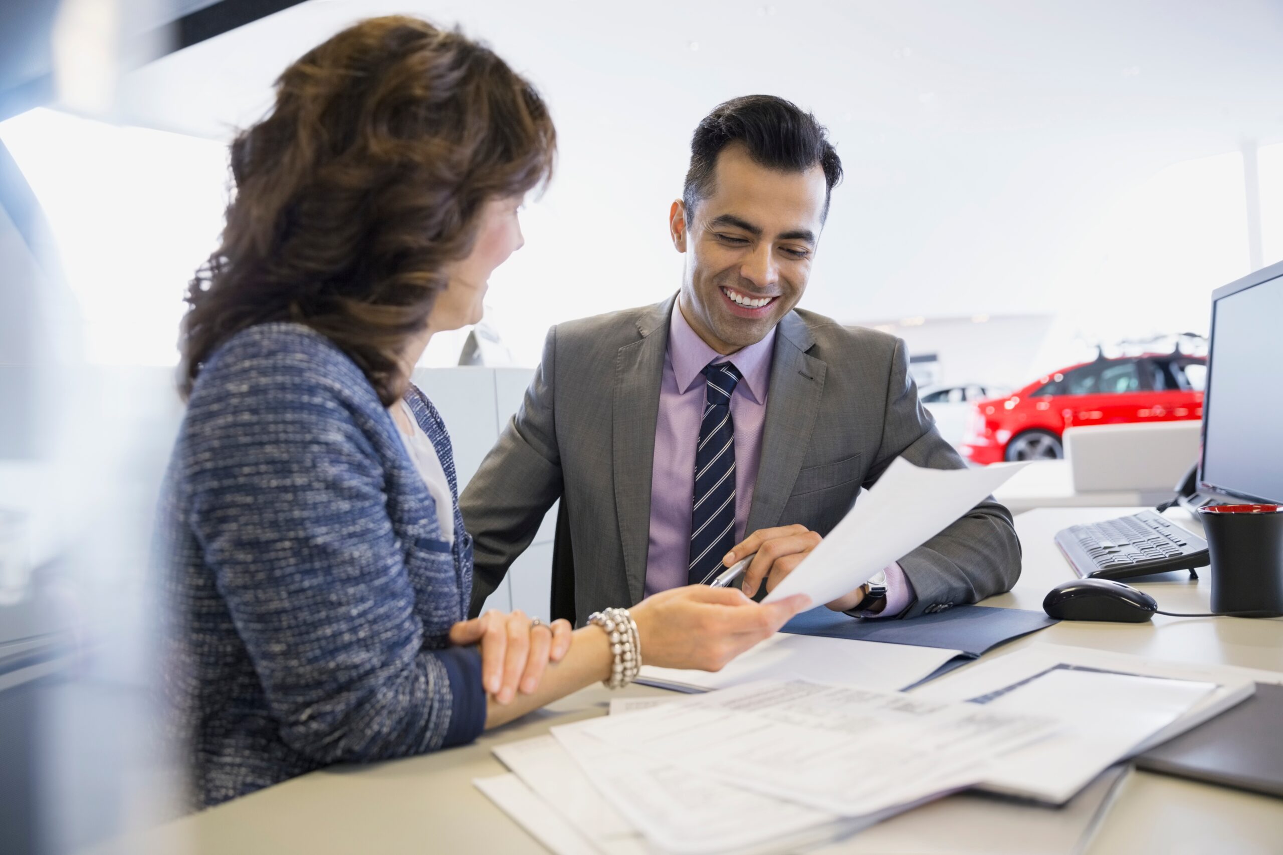 A salesperson finalizing a deal with his client